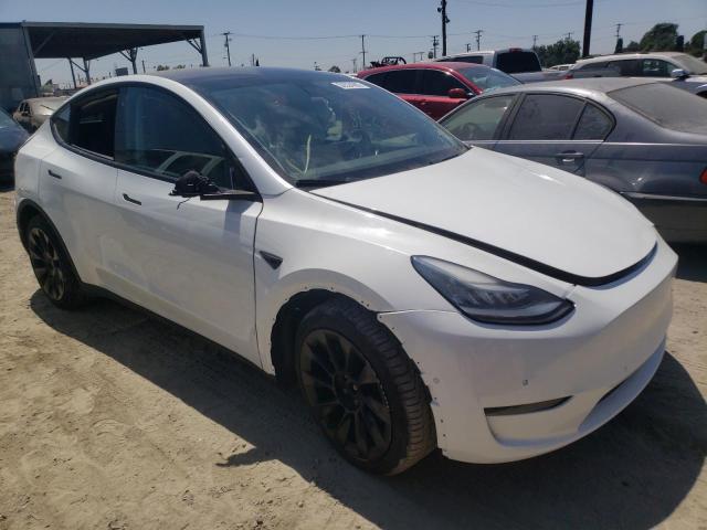 TESLA MODEL Y 2020 with VIN 5YJYGDEE0LF048324 - Photo from auction