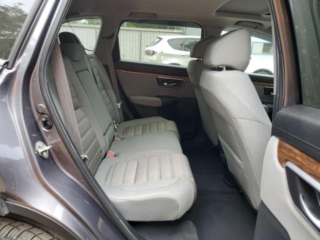Photo 6 from auction – 2017 HONDA CR-V with VIN 5J6RW2H55HL028365