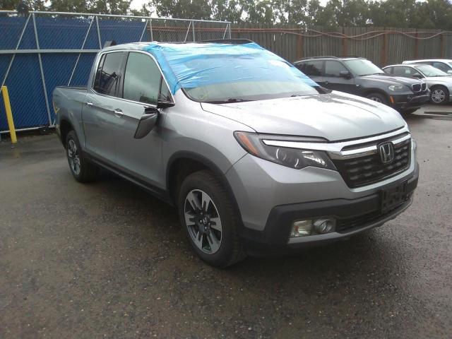HONDA RIDGELINE 2017 with VIN 5FPYK3F71HB011855 - Photo from auction