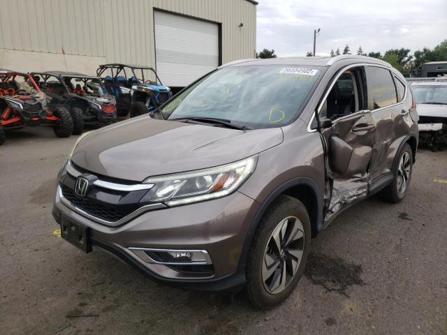 Photo 2 from auction – 2016 HONDA CR-V TOURI with VIN 5J6RM4H97GL012669