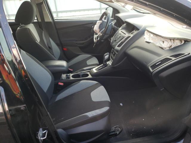 Photo 5 from auction – 2014 FORD FOCUS SE with VIN 1FADP3F27EL440851