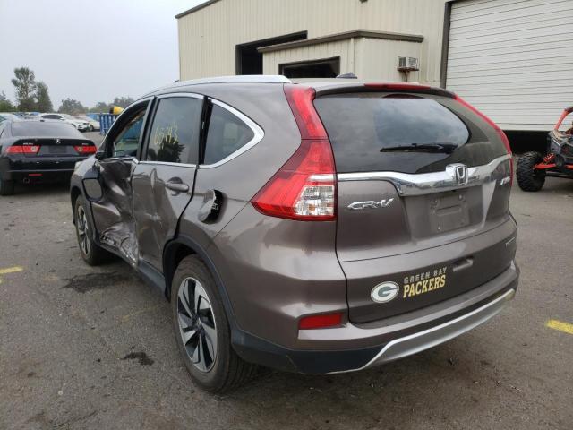 Photo 3 from auction – 2016 HONDA CR-V TOURI with VIN 5J6RM4H97GL012669