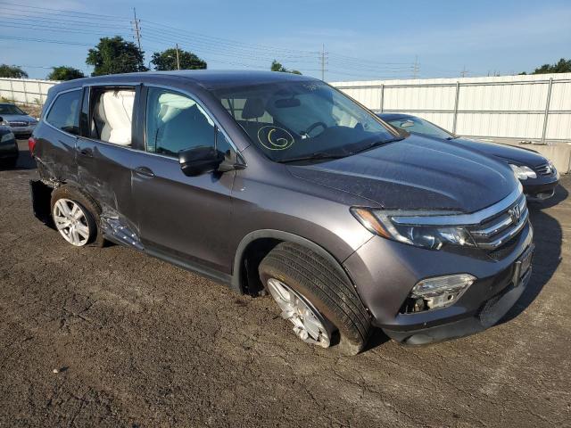 HONDA PILOT LX 2017 with VIN 5FNYF5H15HB041300 - Photo from auction