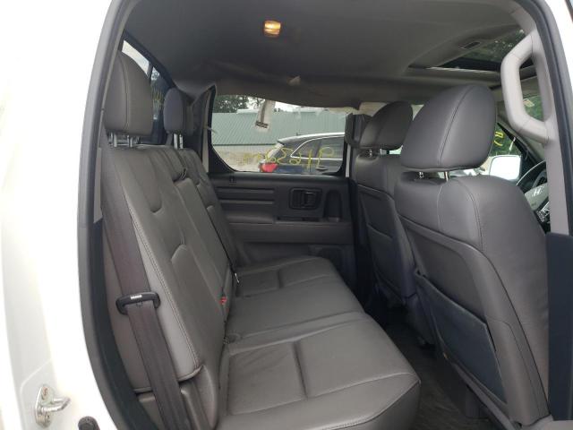 Photo 6 from auction – 2013 HONDA RIDGELINE with VIN 5FPYK1F52DB017130