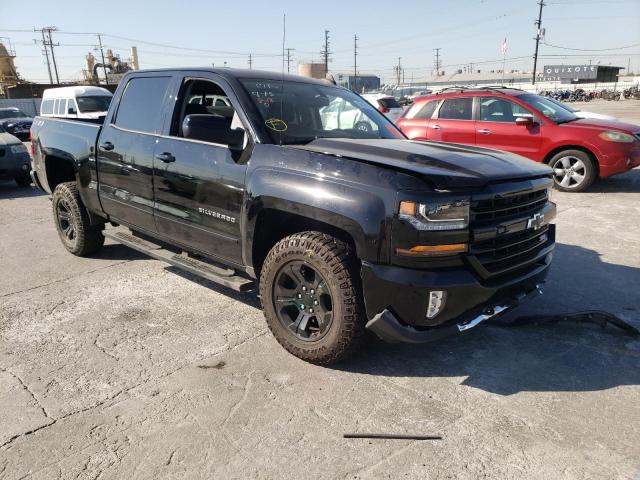 CHEVROLET SILVERADO 2018 with VIN 3GCUKREC8JG367308 - Photo from auction