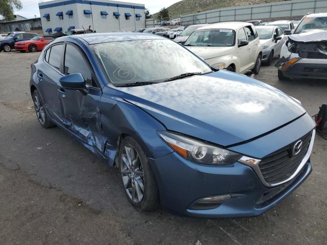 MAZDA 3 TOURING 2018 with VIN 3MZBN1L36JM263806 - Photo from auction