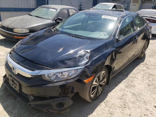 Photo 2 from auction – 2018 HONDA CIVIC EX with VIN JHMFC1F31JX040975