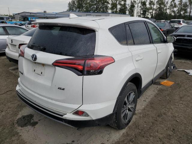 Photo 4 from auction – 2017 TOYOTA RAV4 XLE with VIN JTMWFREV5HJ142674