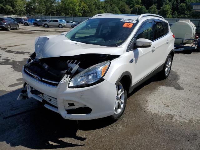 Photo 2 from auction – 2016 FORD ESCAPE TIT with VIN 1FMCU9JX5GUA37108