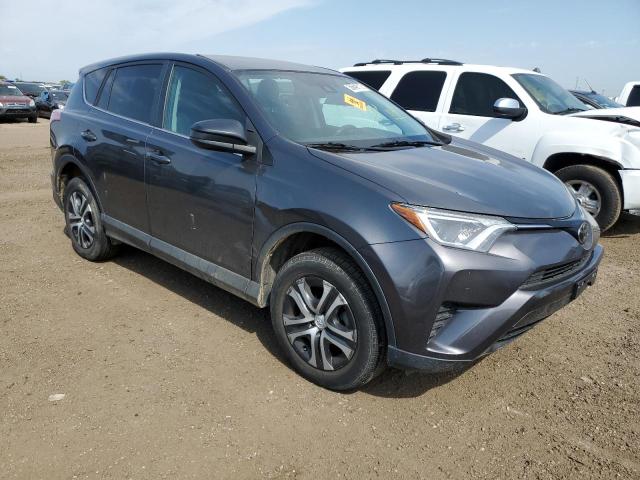 TOYOTA RAV4 LE 2018 with VIN 2T3BFREV7JW765610 - Photo from auction
