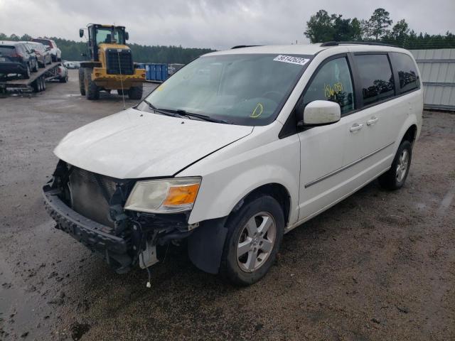 Photo 2 from auction – 2010 DODGE GRAND CARA with VIN 2D4RN5D19AR459658