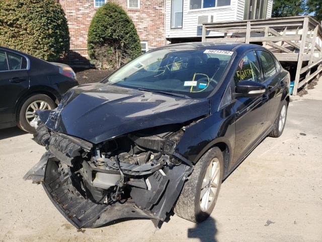 Photo 2 from auction – 2015 FORD FOCUS SE with VIN 1FADP3F23FL338111