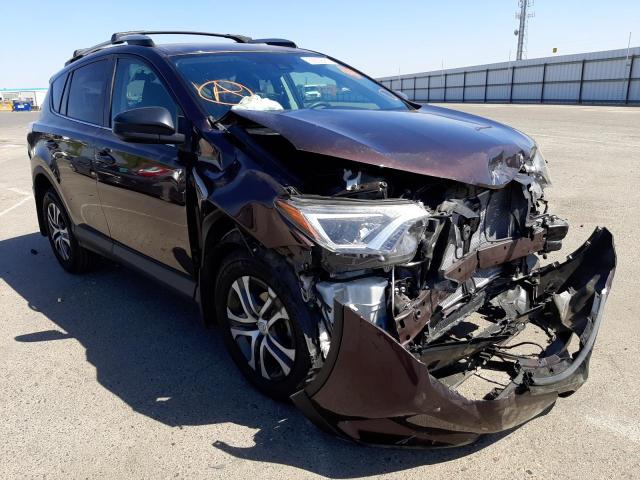 TOYOTA RAV4 LE 2018 with VIN 2T3ZFREV8JW463869 - Photo from auction