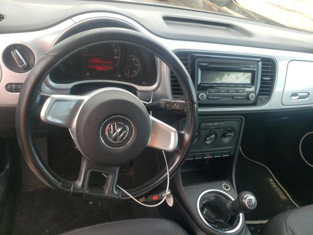 Photo 9 from auction – 2012 VOLKSWAGEN BEETLE with VIN 3VWHP7AT5CM623595