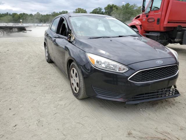 FORD FOCUS S 2015 with VIN 1FADP3E27FL308353 - Photo from auction