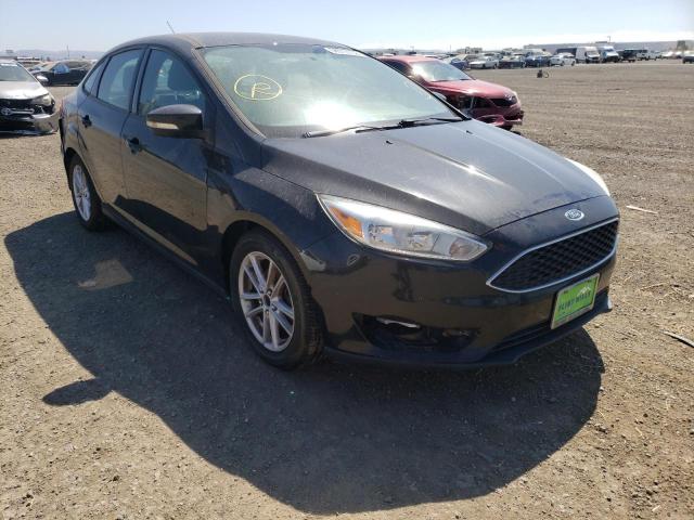 FORD FOCUS SE 2015 with VIN 1FADP3F28FL205263 - Photo from auction