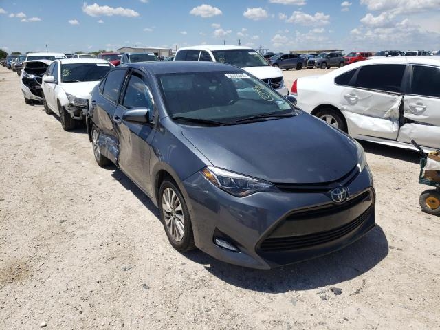 TOYOTA COROLLA L 2018 with VIN 5YFBURHE7JP745353 - Photo from auction