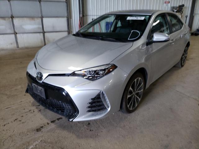Photo 2 from auction – 2018 TOYOTA COROLLA L with VIN 5YFBURHE5JP775791