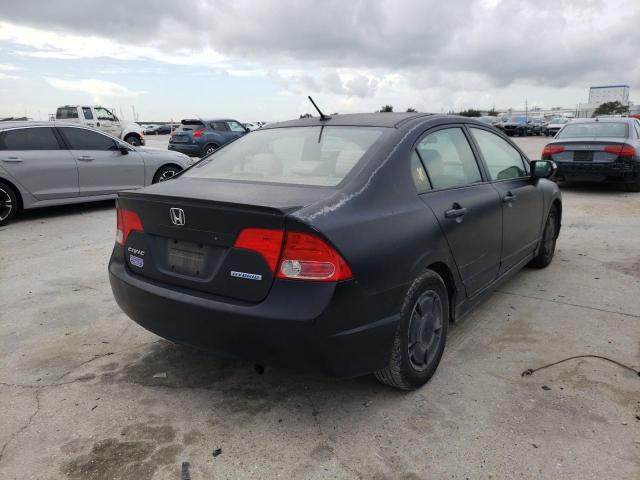 Photo 4 from auction – 2006 HONDA CIVIC HYBR with VIN JHMFA36236S012205