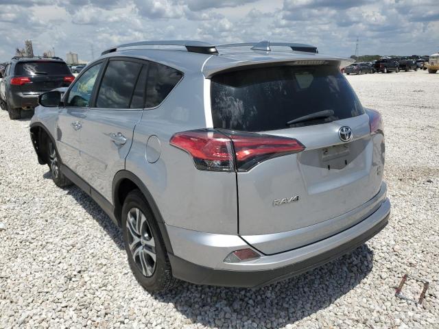 Photo 3 from auction – 2018 TOYOTA RAV4 LE with VIN 2T3BFREV9JW702010