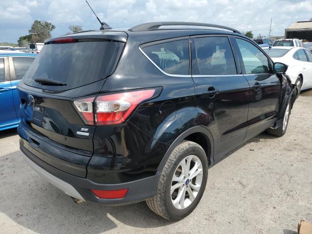 Photo 4 from auction – 2018 FORD ESCAPE SE with VIN 1FMCU0GDXJUC16406