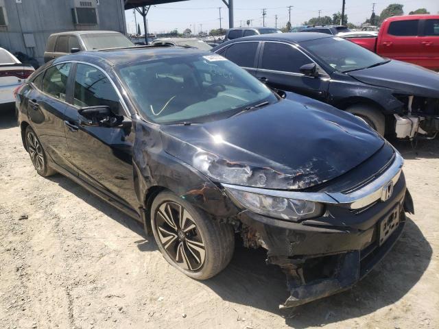 HONDA CIVIC EX 2018 with VIN JHMFC1F31JX040975 - Photo from auction