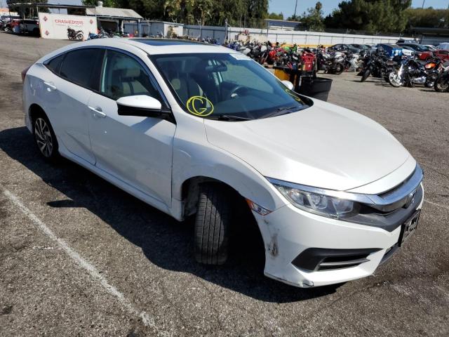 HONDA CIVIC EX 2018 with VIN 19XFC2F72JE200470 - Photo from auction