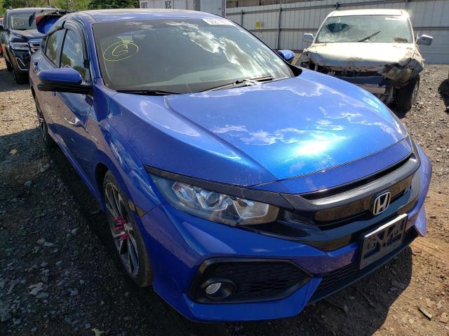 HONDA CIVIC SI 2019 with VIN 2HGFC1E57KH704322 - Photo from auction