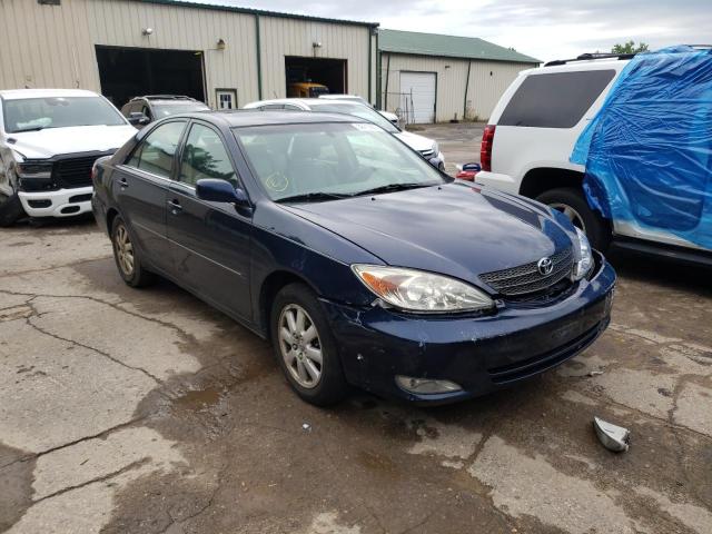 TOYOTA CAMRY LE 2004 with VIN 4T1BF30K74U062905 - Photo from auction