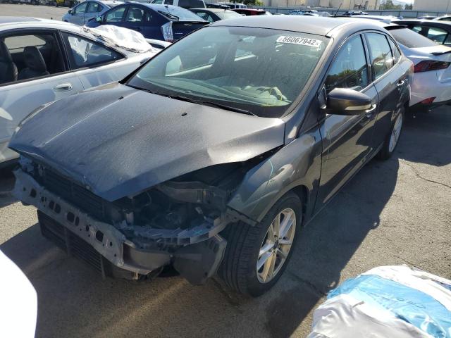 Photo 2 from auction – 2015 FORD FOCUS SE with VIN 1FADP3F24FL318790