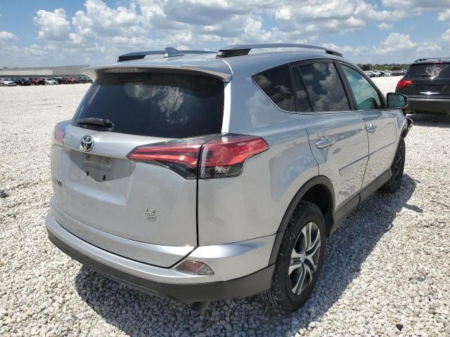 Photo 4 from auction – 2018 TOYOTA RAV4 LE with VIN 2T3BFREV9JW702010