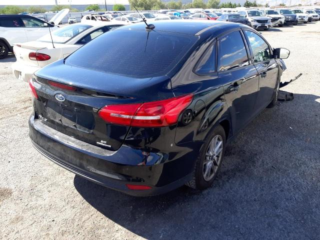 Photo 4 from auction – 2015 FORD FOCUS SE with VIN 1FADP3F27FL241400