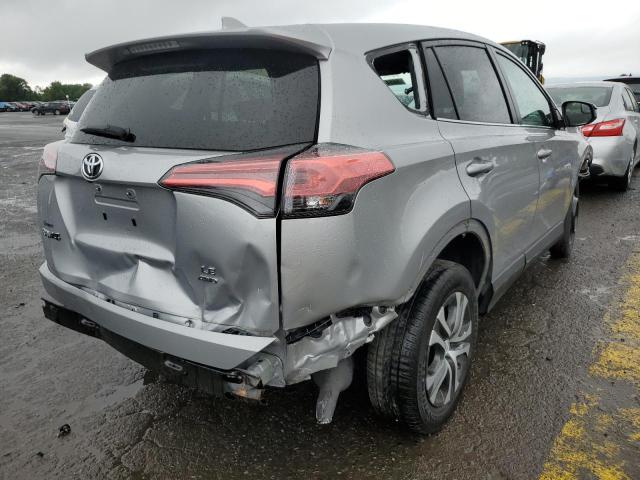 Photo 4 from auction – 2018 TOYOTA RAV4 LE with VIN 2T3BFREV9JW781775