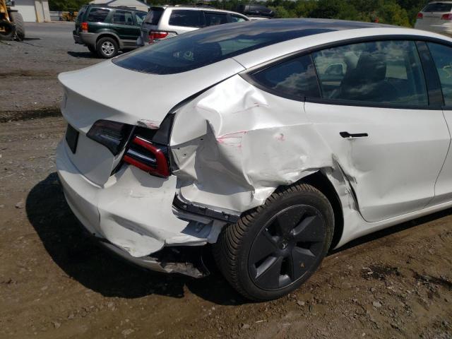 Photo 9 from auction – 2021 TESLA MODEL 3 with VIN 5YJ3E1EA6MF062936
