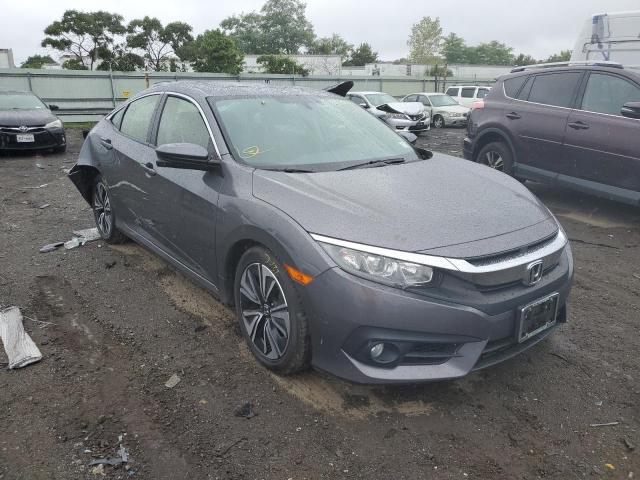 HONDA CIVIC EX 2018 with VIN JHMFC1F32JX000758 - Photo from auction