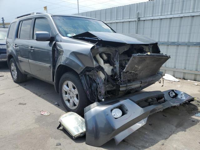 HONDA PILOT TOUR 2011 with VIN 5FNYF4H90BB033919 - Photo from auction