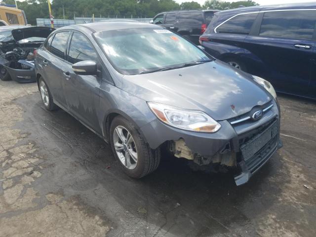 FORD FOCUS SE 2014 with VIN 1FADP3F24EL387705 - Photo from auction