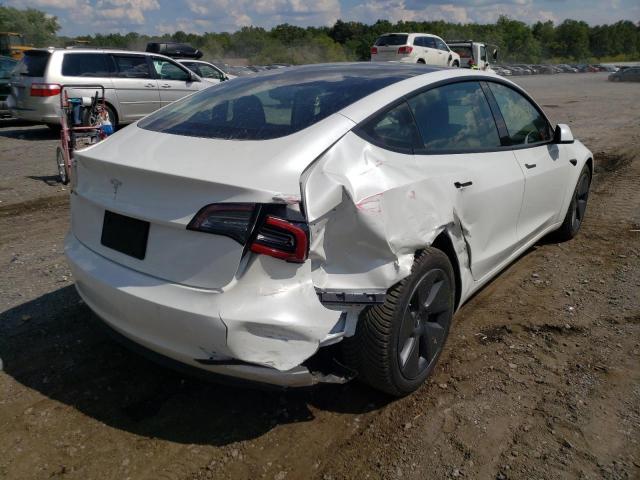 Photo 4 from auction – 2021 TESLA MODEL 3 with VIN 5YJ3E1EA6MF062936