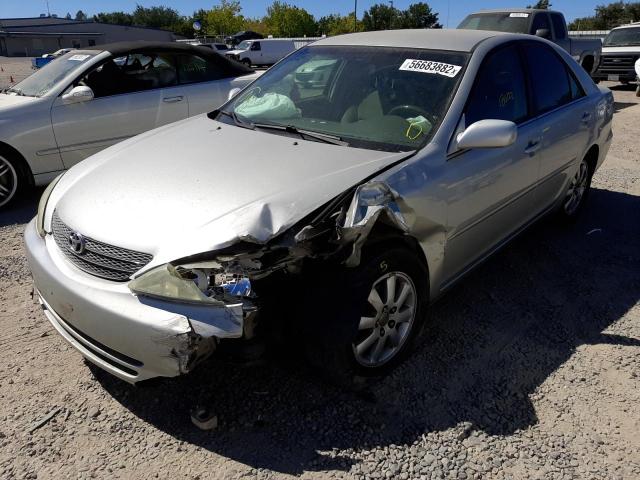 Photo 2 from auction – 2002 TOYOTA CAMRY LE with VIN JTDBE30K120047246