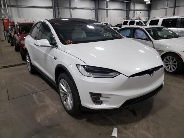 TESLA MODEL X 2020 with VIN 5YJXCAE28LF263896 - Photo from auction