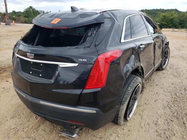 Photo 4 from auction – 2018 CADILLAC XT5 with VIN 1GYKNARS0JZ235168