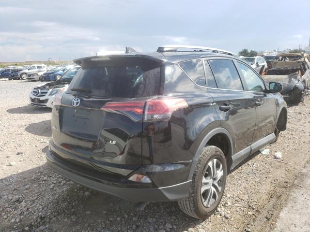 Photo 4 from auction – 2018 TOYOTA RAV4 LE with VIN 2T3ZFREV2JW455976