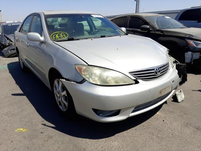 TOYOTA CAMRY LE 2005 with VIN 4T1BF30K55U096794 - Photo from auction