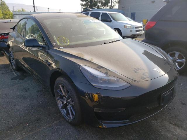 TESLA MODEL 3 2022 with VIN 5YJ3E1EA9NF290060 - Photo from auction