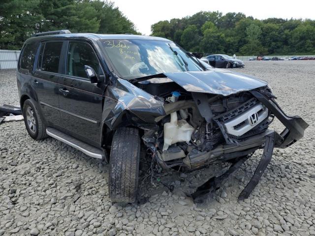 HONDA PILOT TOUR 2011 with VIN 5FNYF4H95BB075292 - Photo from auction