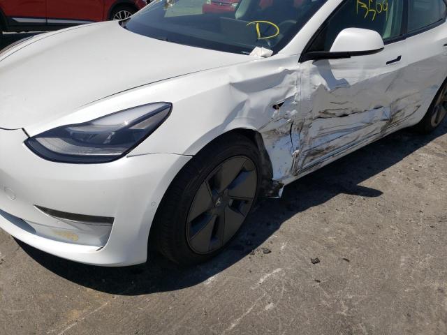 Photo 9 from auction – 2021 TESLA MODEL 3 with VIN 5YJ3E1EA1MF053125