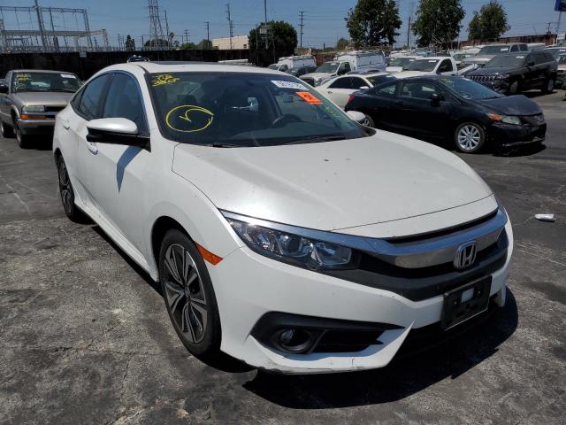 HONDA CIVIC EX 2018 with VIN JHMFC1F36JX037506 - Photo from auction