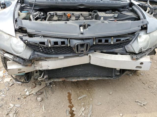 Photo 9 from auction – 2011 HONDA CIVIC LX with VIN 19XFA1F59BE033573