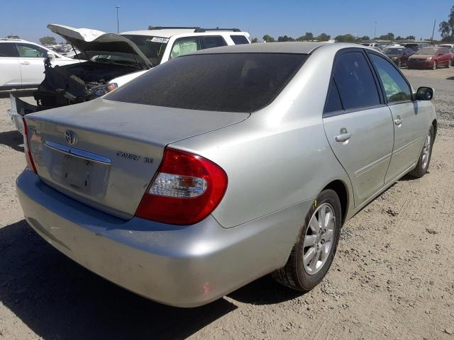Photo 4 from auction – 2002 TOYOTA CAMRY LE with VIN JTDBE30K120047246