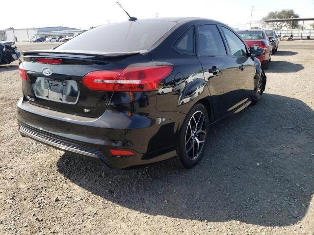 Photo 4 from auction – 2016 FORD FOCUS SE with VIN 1FADP3F24GL306317